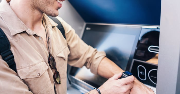 Mam using watch to scan on an ATM